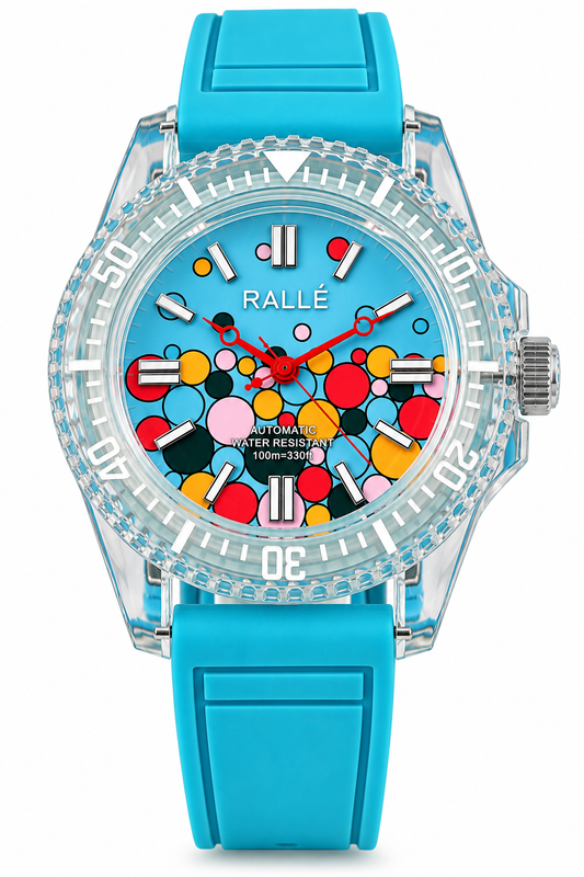 A Rallé automatic water resistance watch with a bright turquoise blue silicone strap, a clear crystal case, and a colorful dial featuring a multicolor polka dot pattern on a light blue background.