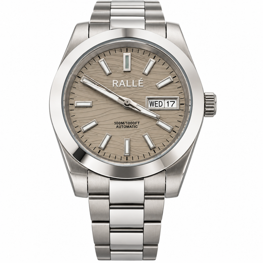 A RALLE 300m automatic watch with a brushed silver stainless steel case and bracelet, featuring a textured beige dial with silver-tone indices and a day-date window.