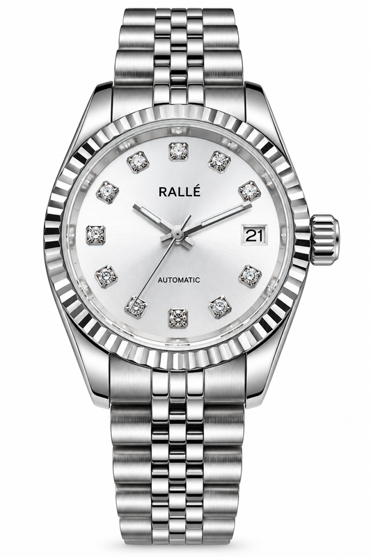 A Rallé women's automatic watch featuring a silver stainless steel jubilee bracelet, a fluted bezel, and a white dial with diamond hour markers and a date window.