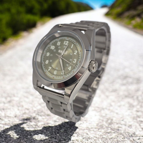 Rallé FULL CIRCLE - GREEN Watch - Wrist shot showing premium stainless steel case and dial details.