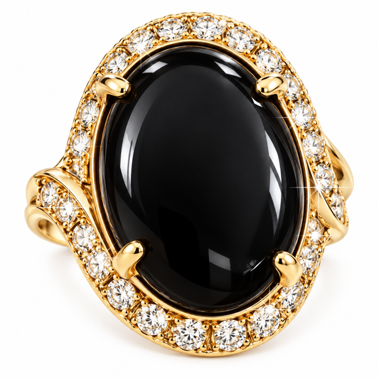 A yellow gold ring featuring a large, polished black onyx cabochon center stone, surrounded by a halo of small round clear diamonds, set against a plain white background.