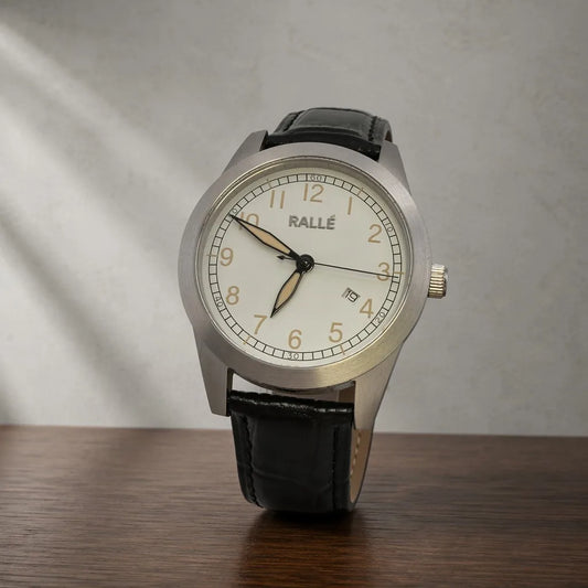 Rallé Stella White - Front view on dark wood surface showing cream dial with Arabic numerals and black leather strap, reflecting refined craftsmanship and premium detail.